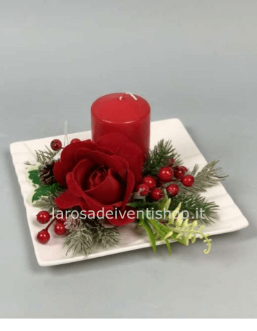 Composizione fiori rossi e candela