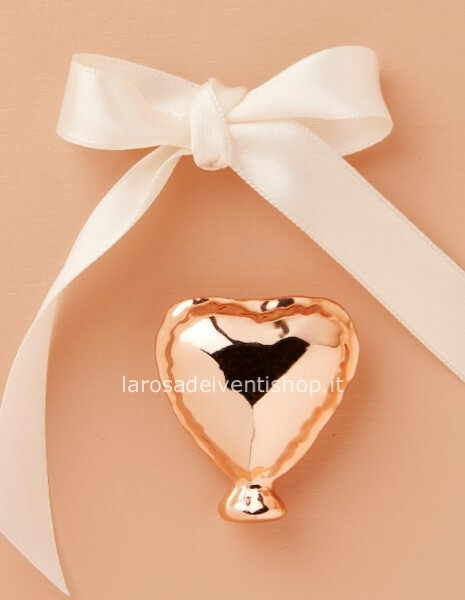 Calamita cuore oro rosa