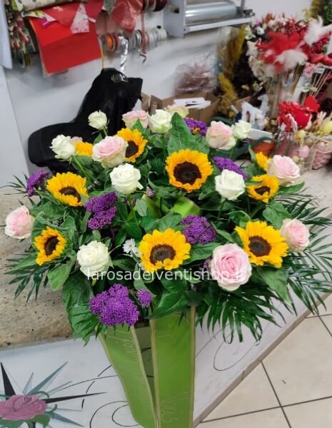 Composizione funebre con girasoli